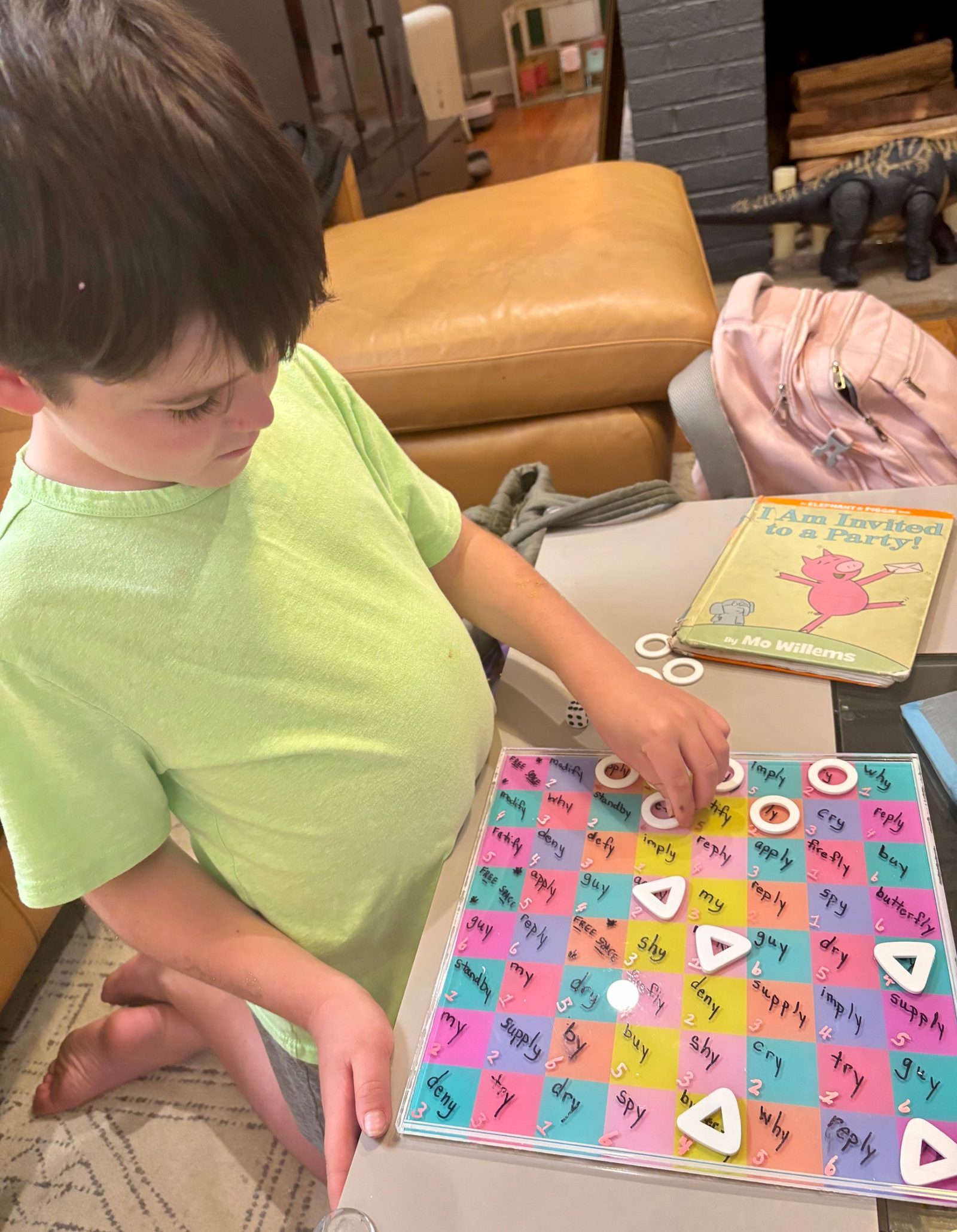 Student playing a sight-word board game