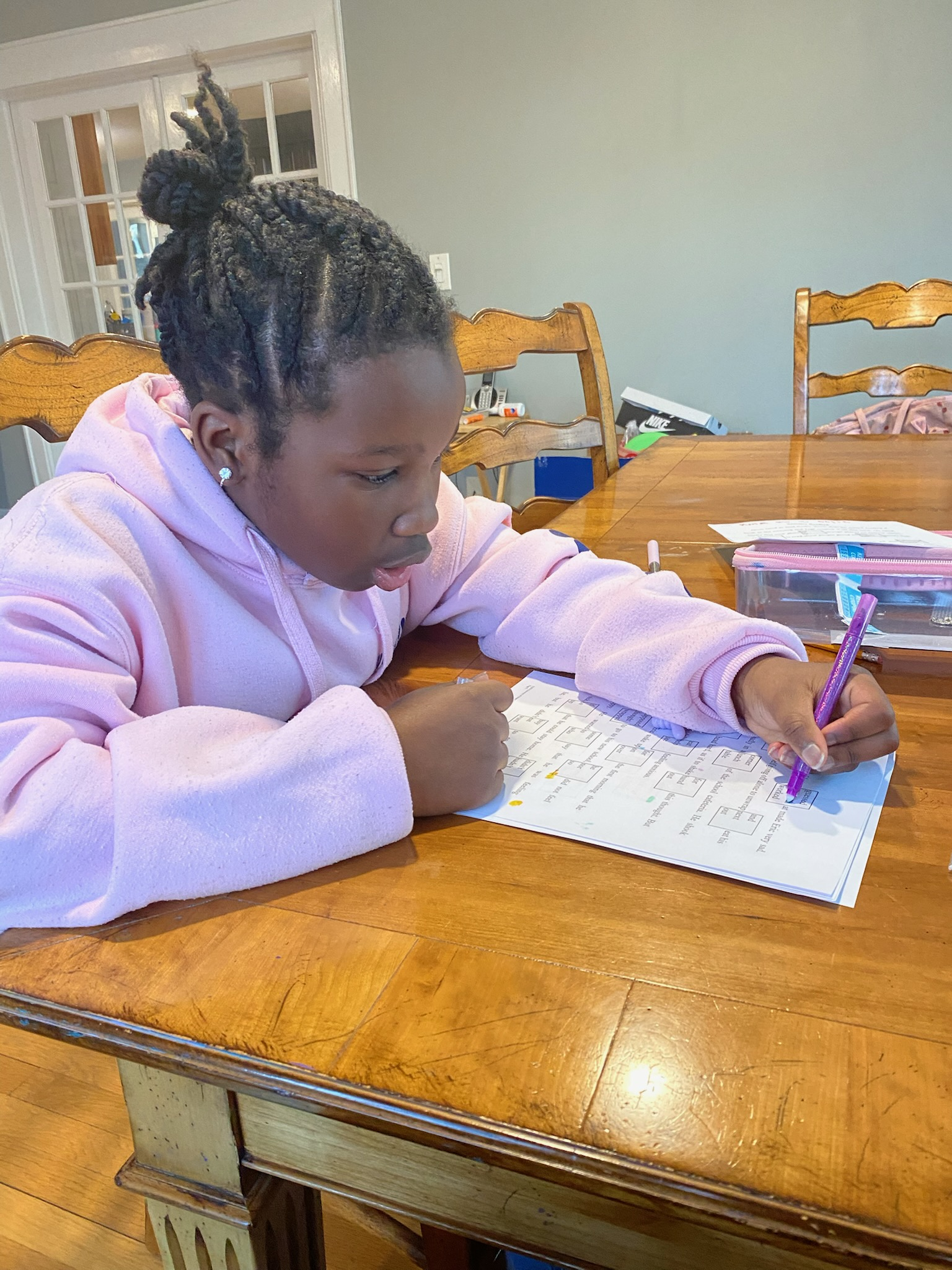 Student organizing earned reward tickets